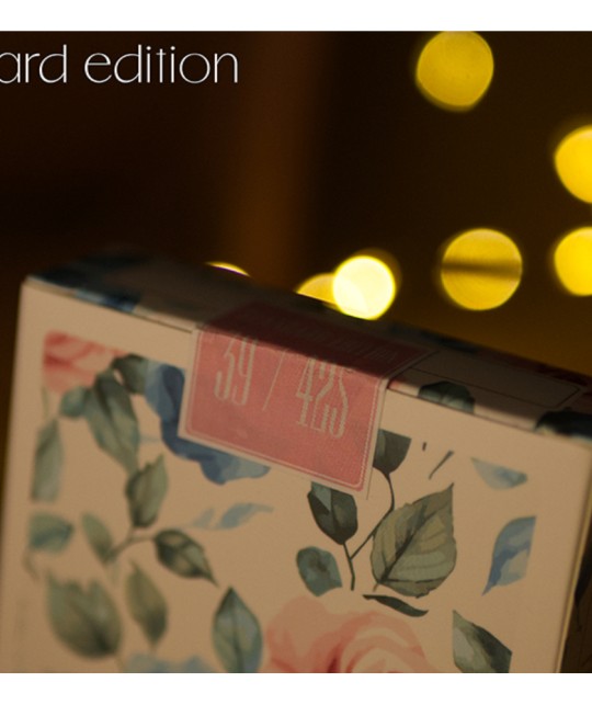 Flower Deck Roses Playing Cards box displayed in artistic setting